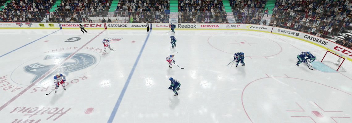 Defense look for a pass up the middle to a centerman. NHL 18