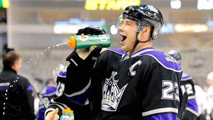 Dustin Brown tries to drink out of water bottle backwards